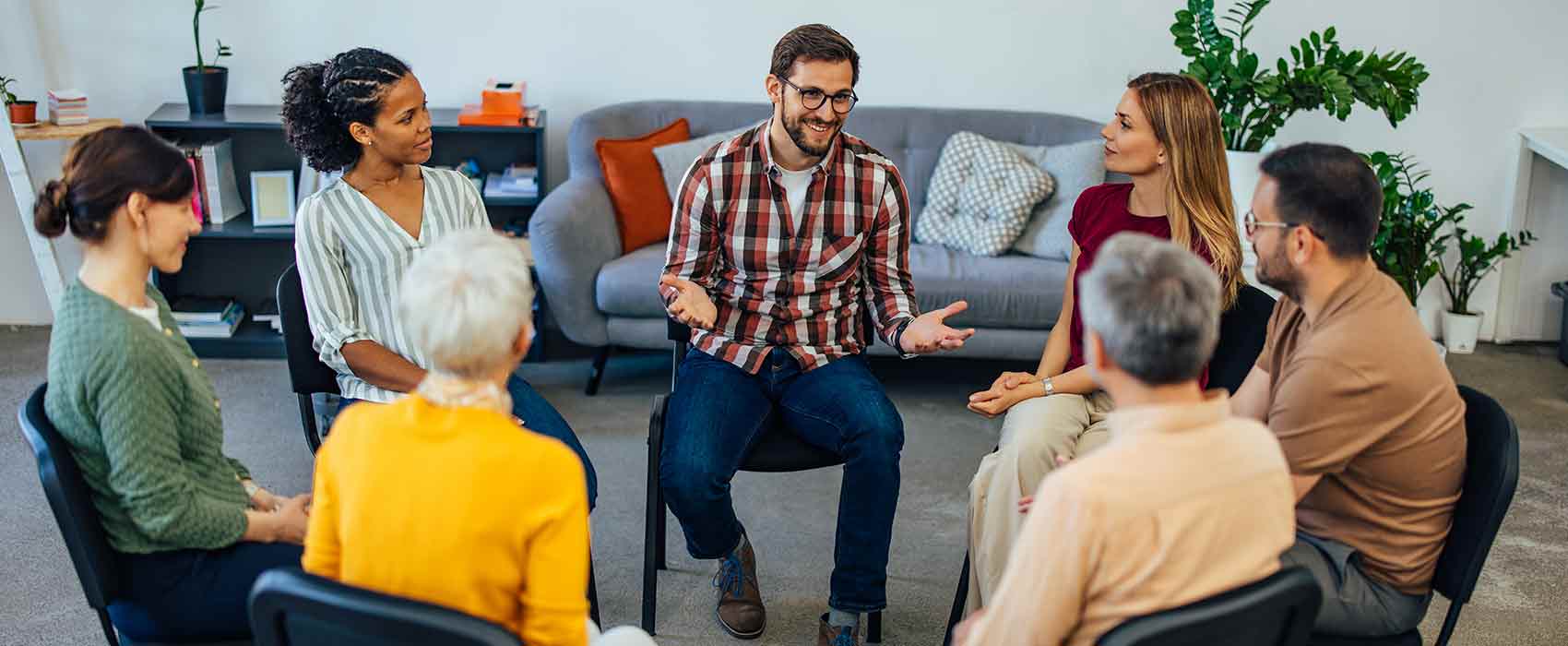 Ostomy support group talking in a circle.