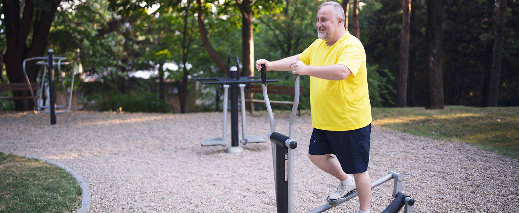 Man using an elliptical.