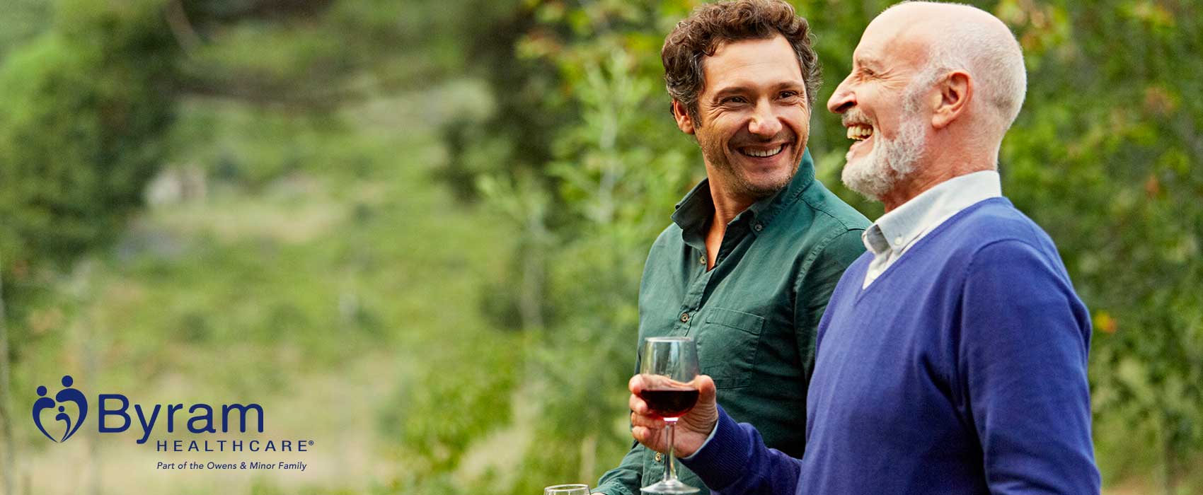 Man drinking wine with his father