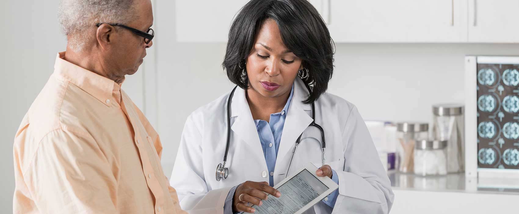 Doctor talking to her diabetes patient.