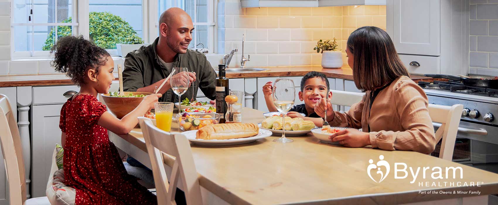 Family eating at a dinner table.