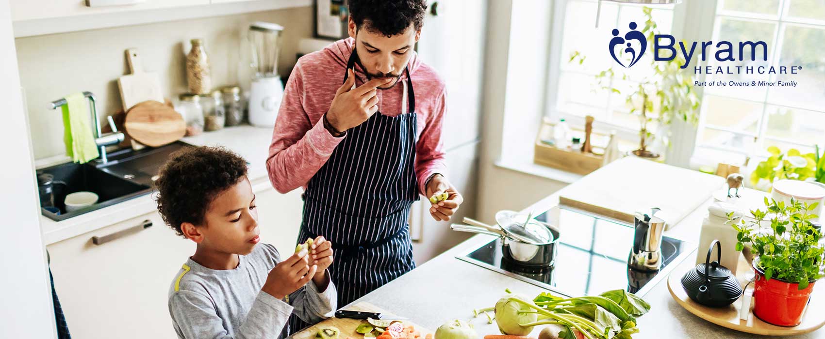 Father and son eating and cooking.