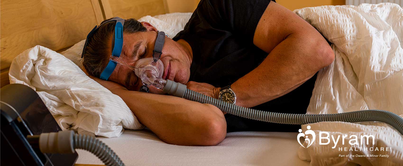 Man using his CPAP machine.