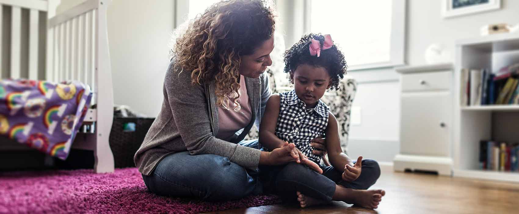 Mom talking to her daughter.