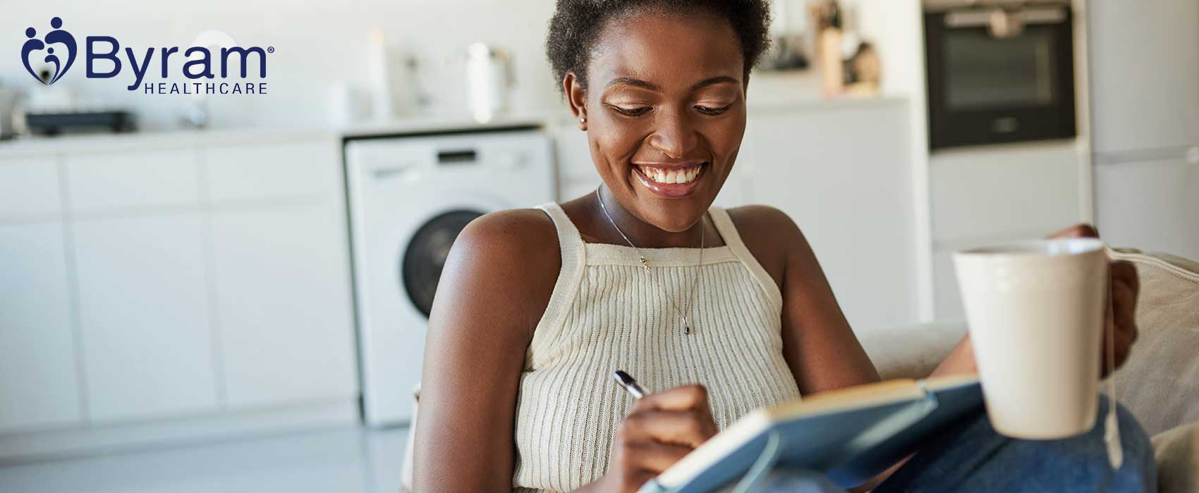 Woman writing a healthcare checklist.