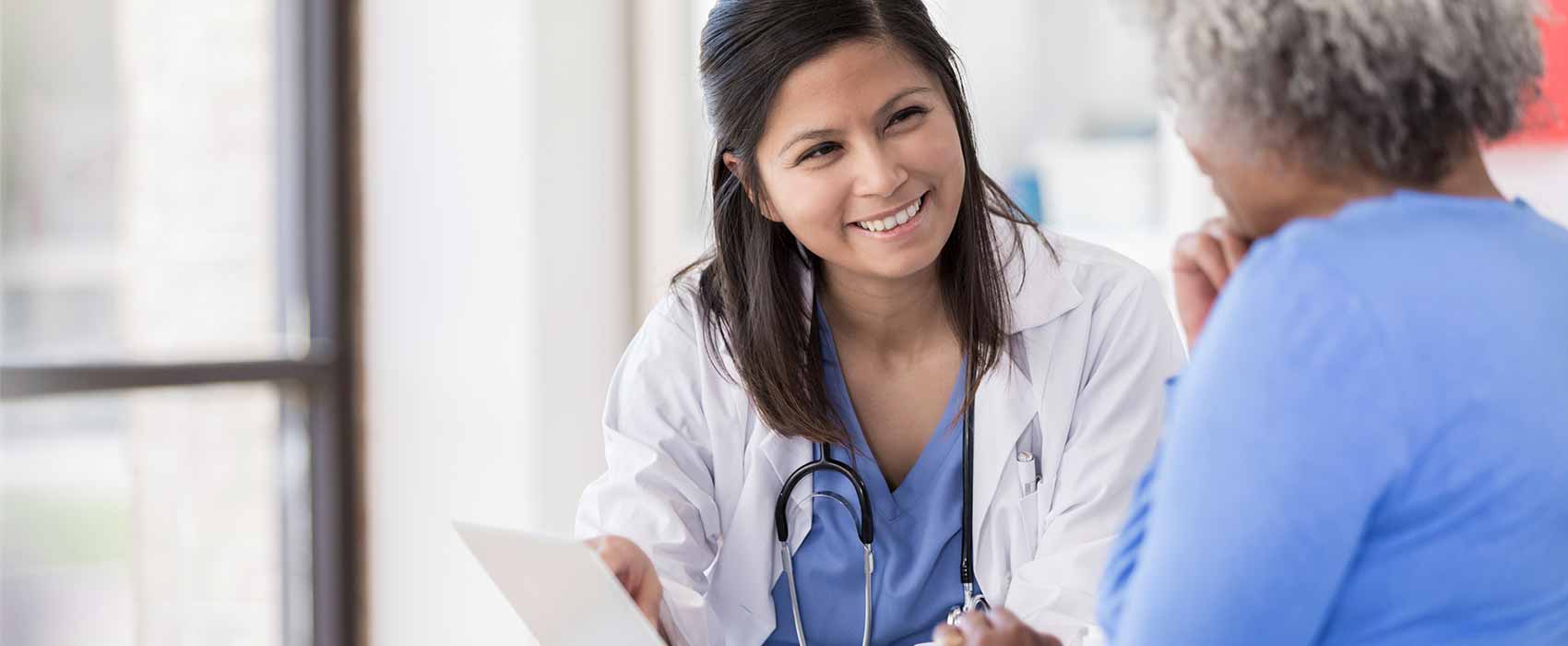 doctor talking to patient