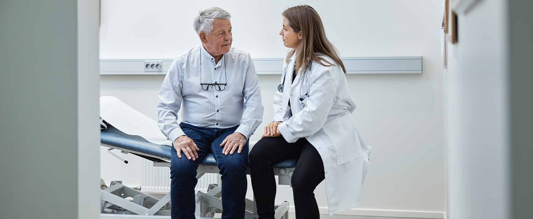 Doctor talking to patient about bladder cancer.