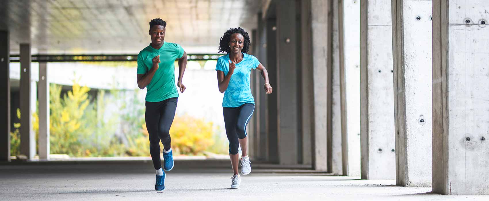 Two people jogging outdoors