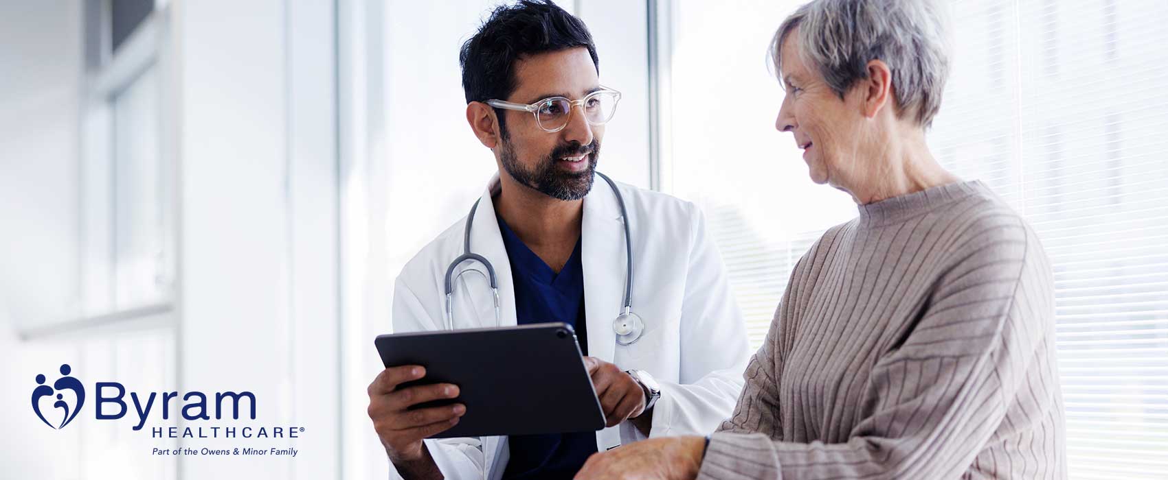 Doctor talking to his older patient.