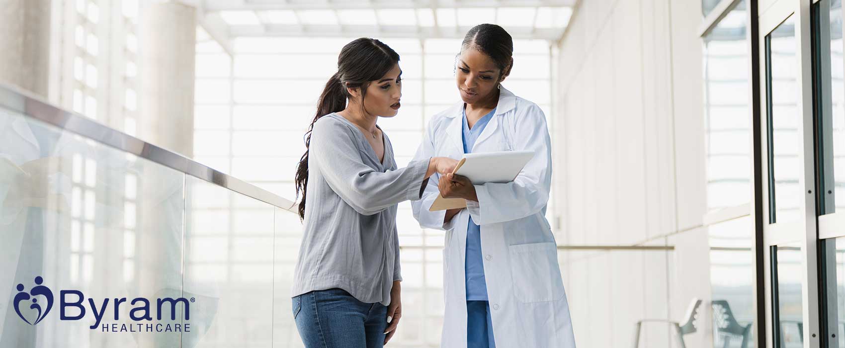 Doctor talking to her patient who has a stoma.