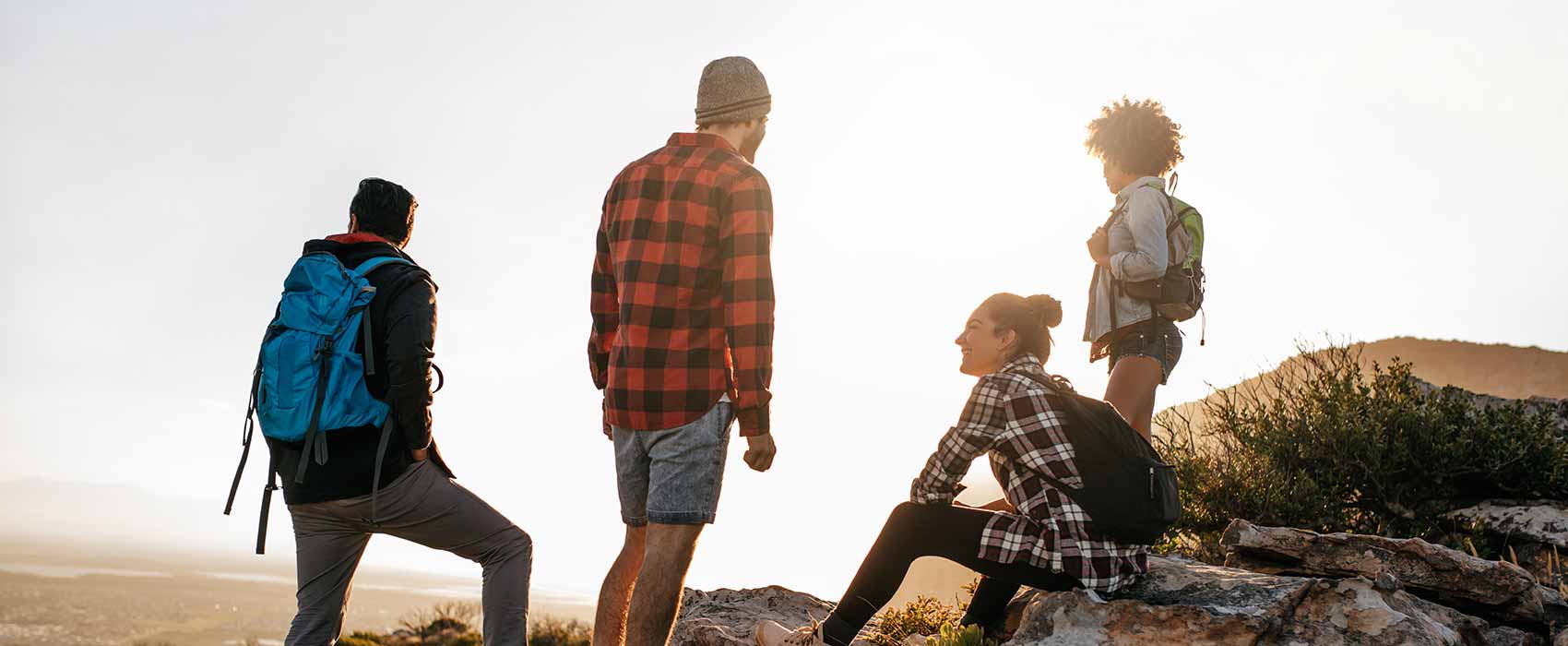 People taking a rest while hiking.