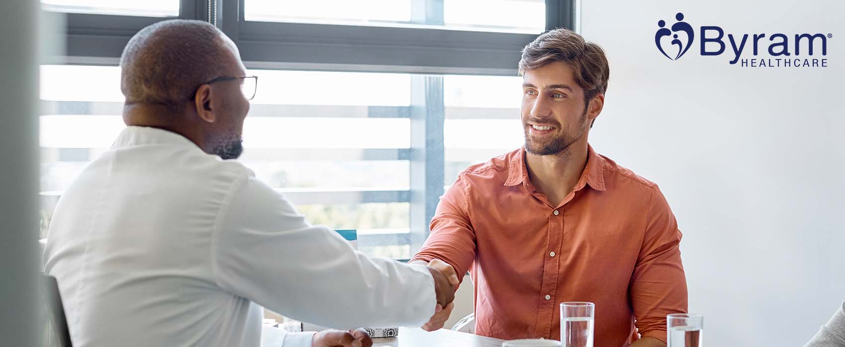 Man shaking hands with his urologist.