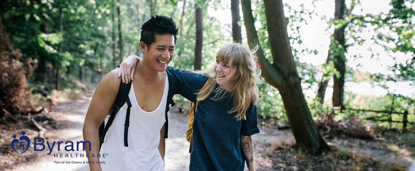 Couple walking in forest