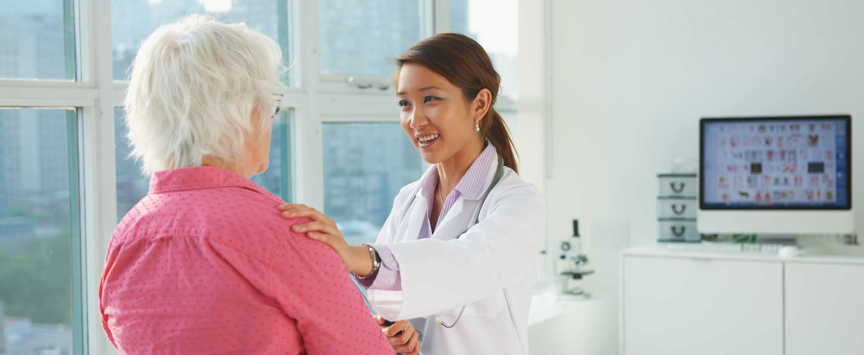 Doctor talking to her patient.
