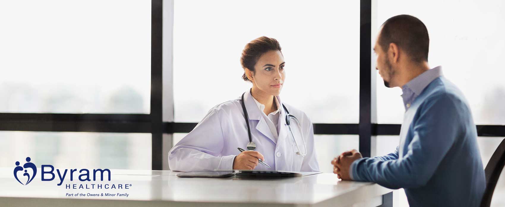 Doctor talking to her urology patient.