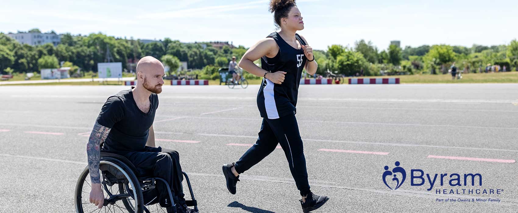 Wheelchair user and friend exercising.