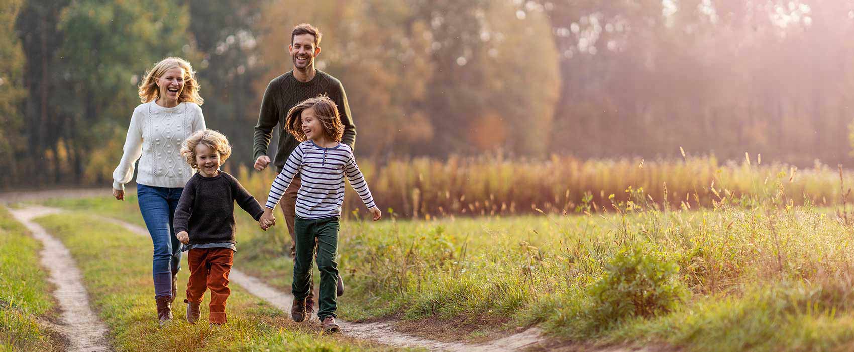 family out for a walk in nature