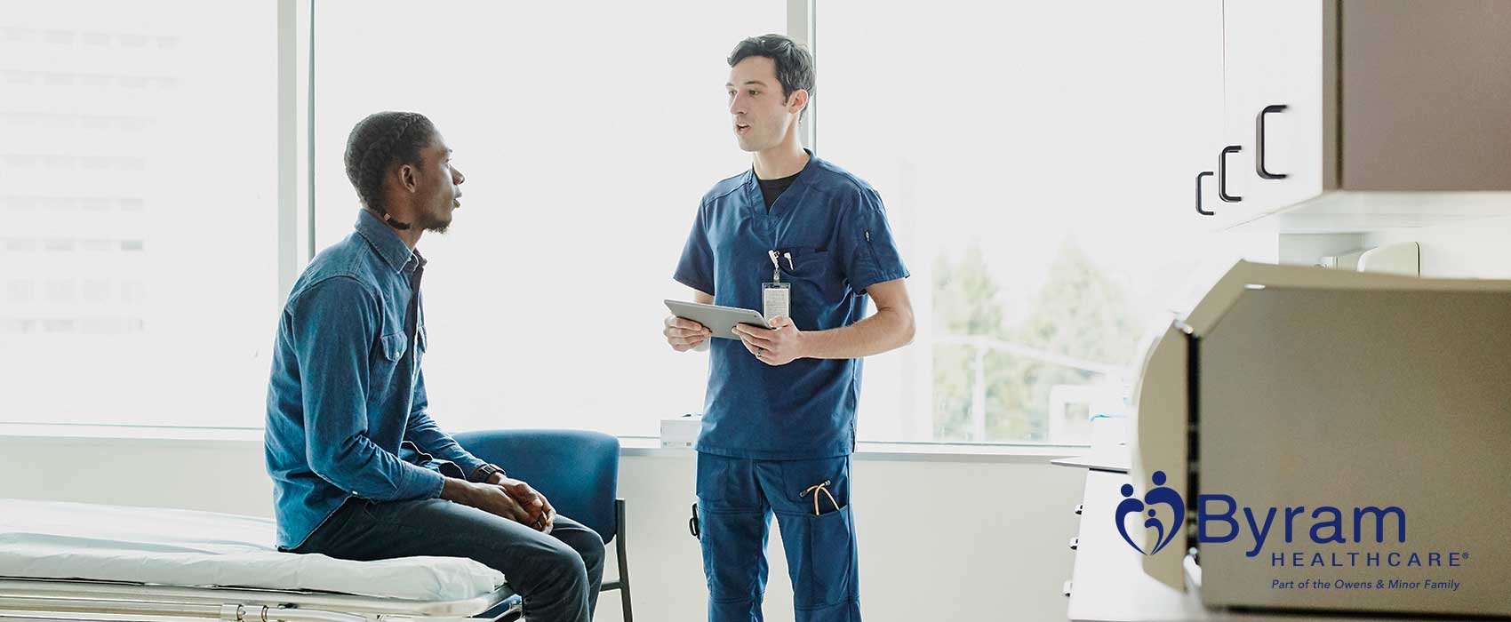 Doctor explaining something to his patient.