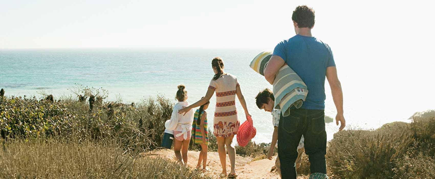 Family walking to the beach.