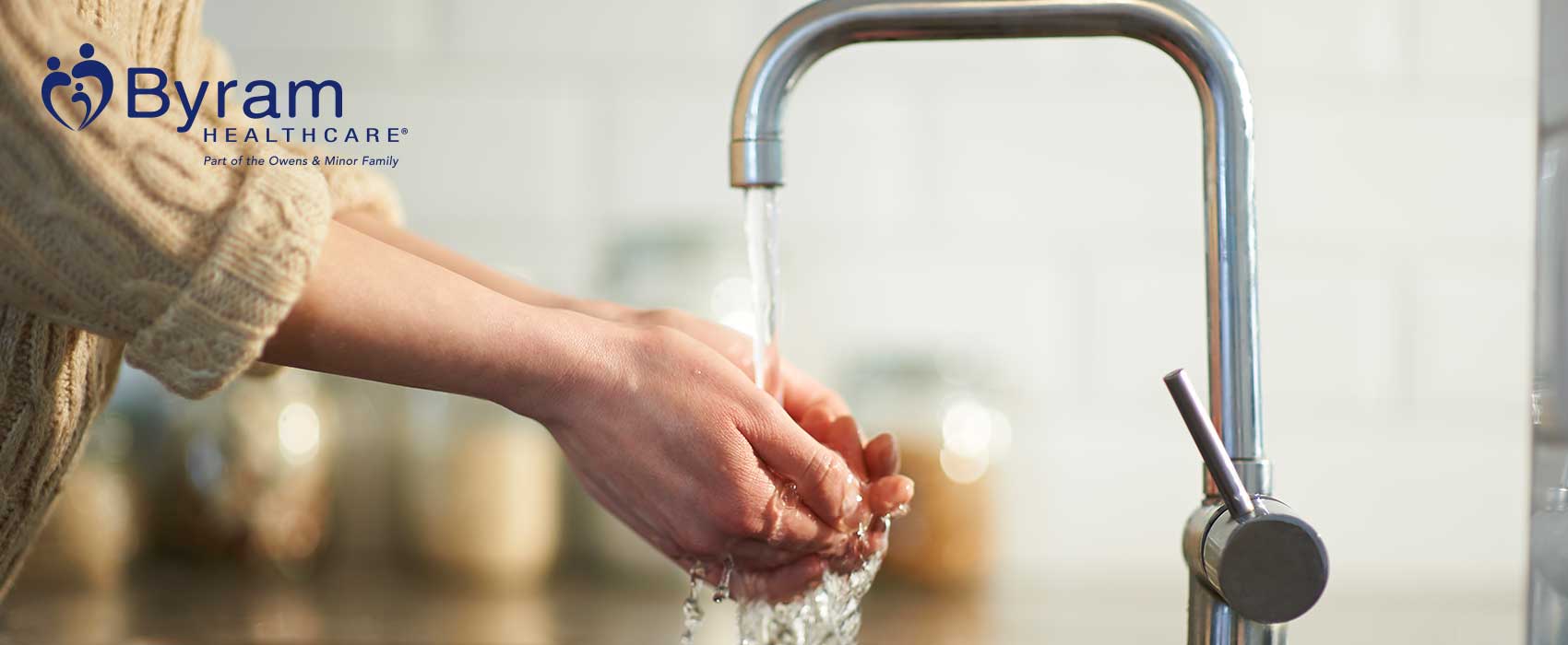 washing hands in sink