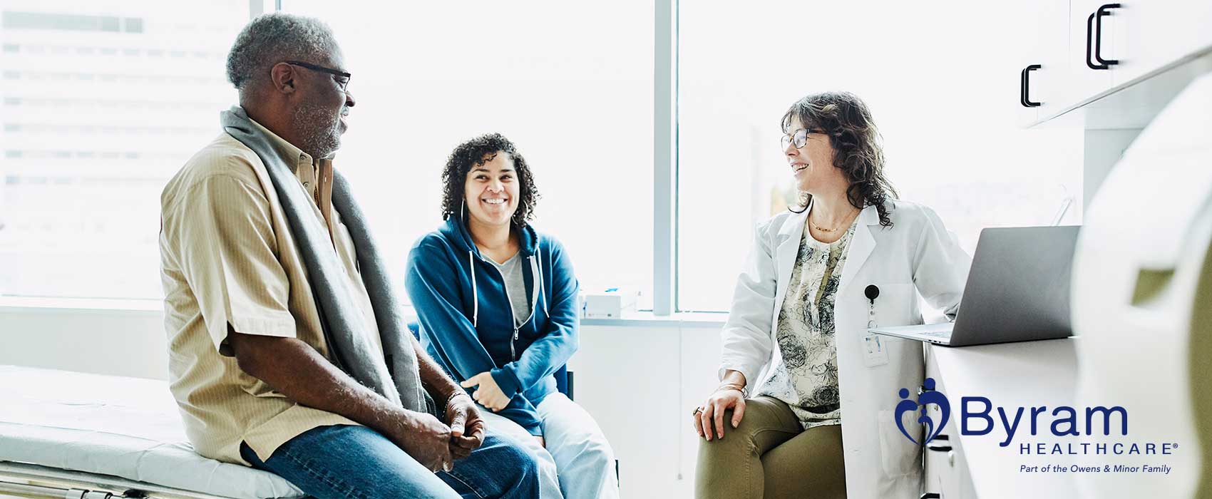 Man and woman talking to their doctor