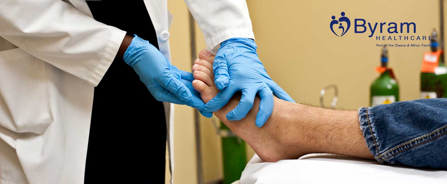 Doctor touching patient's foot.