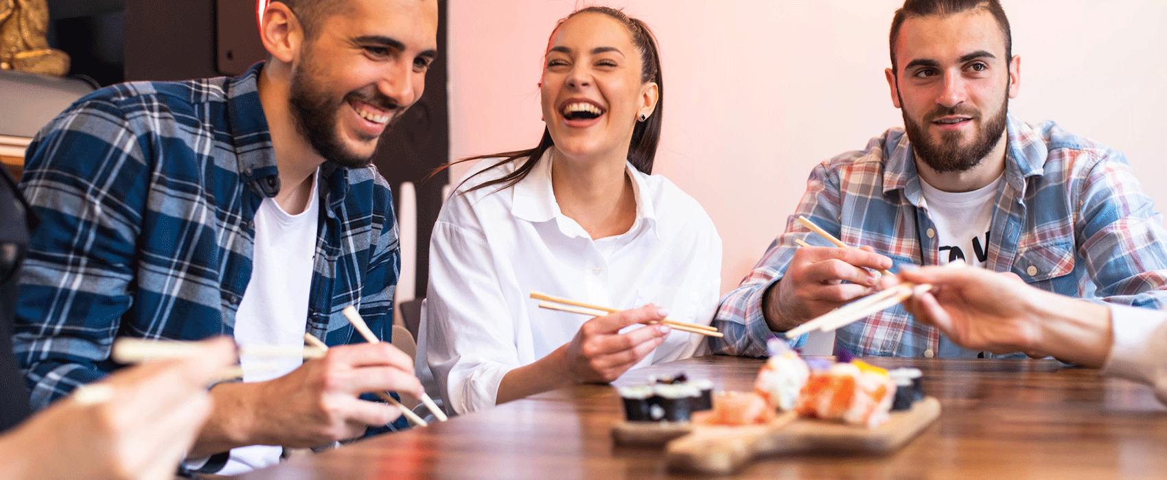 friends eating sushi