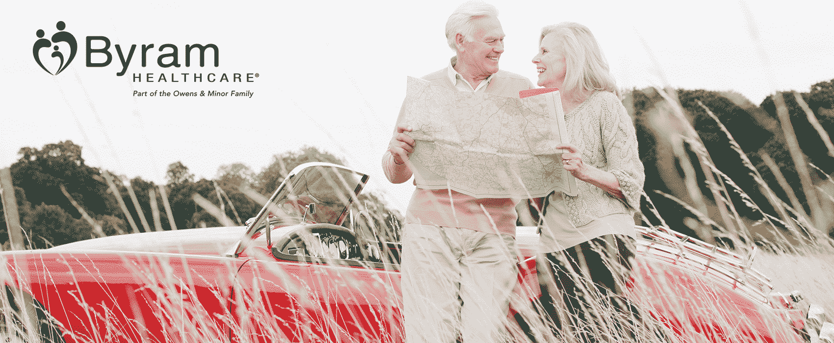 Older Couple Leaning Against Car