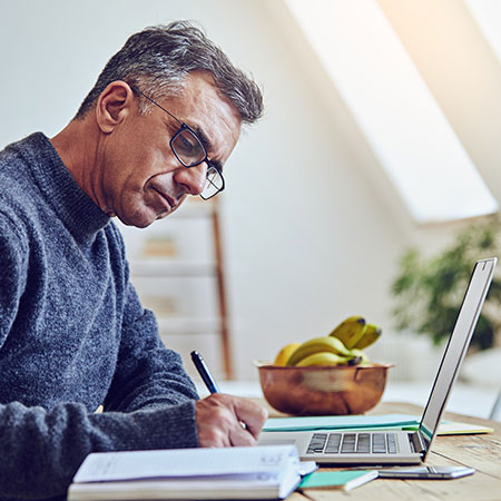man looking at computer
