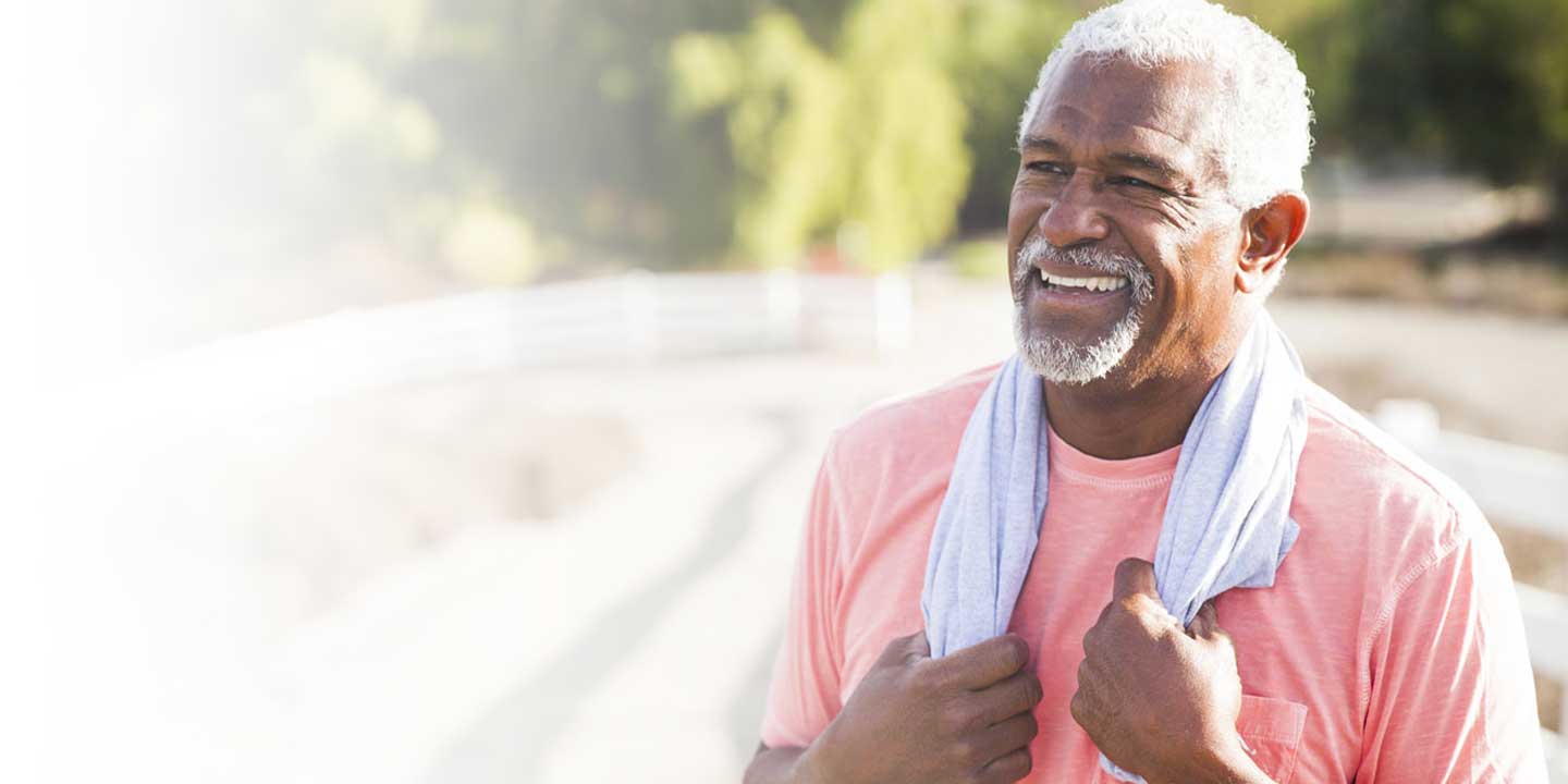 Man outdoors standing on a bridge