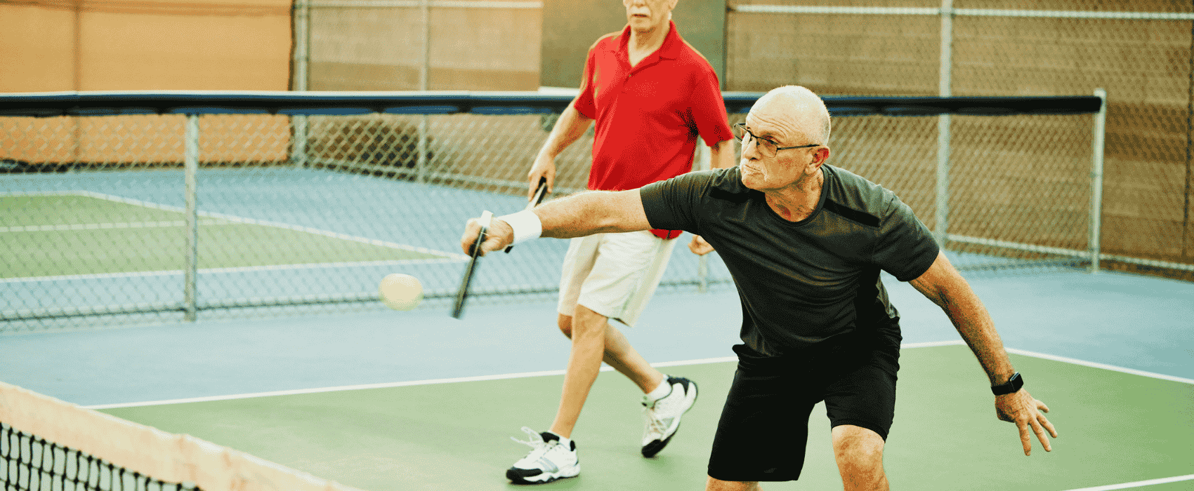 men playing pickleball