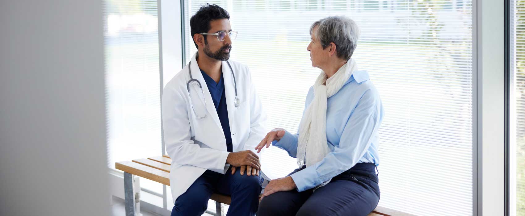 older woman and doctor