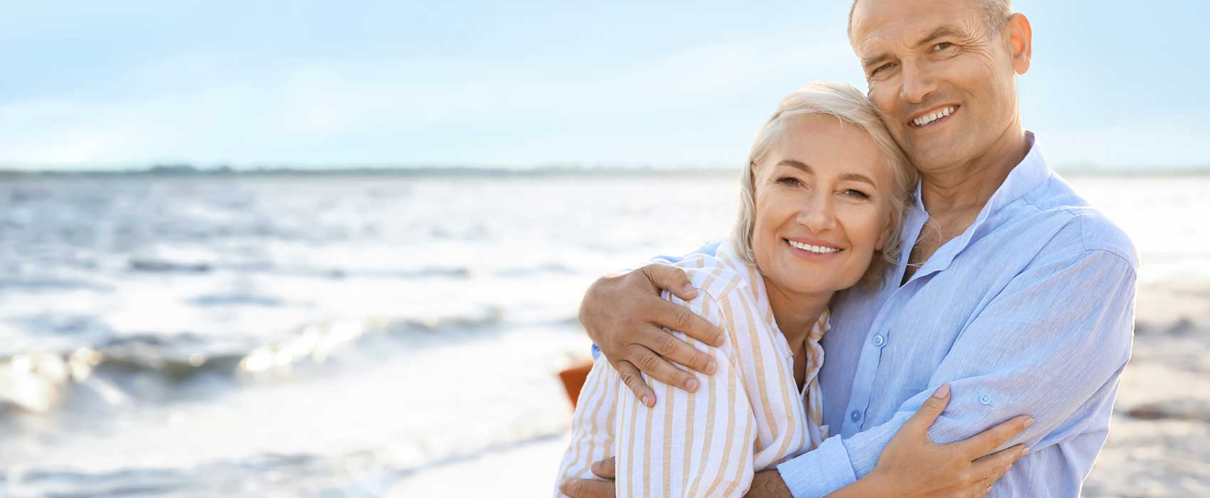retired couple at beach