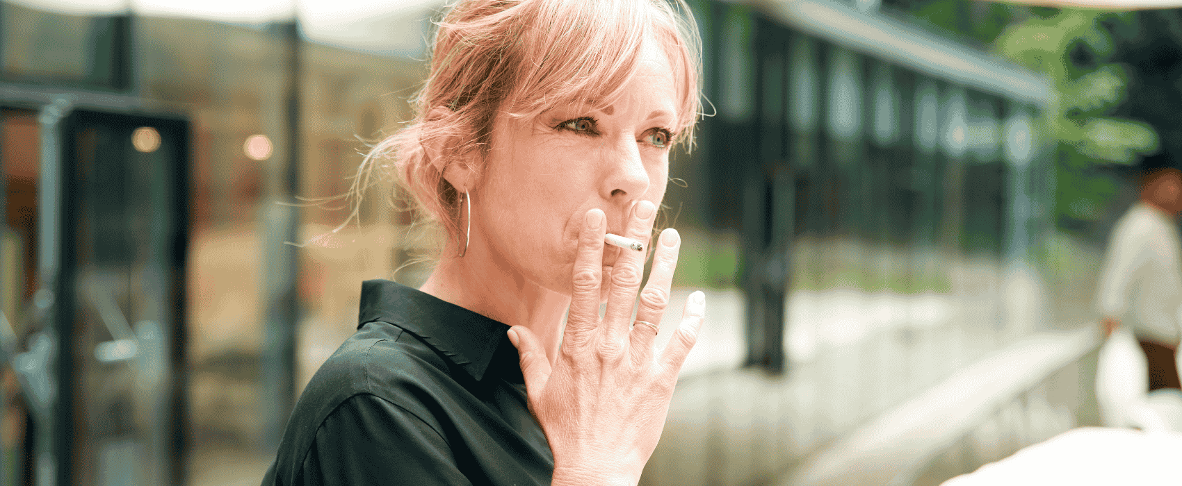 woman smoking cigarette